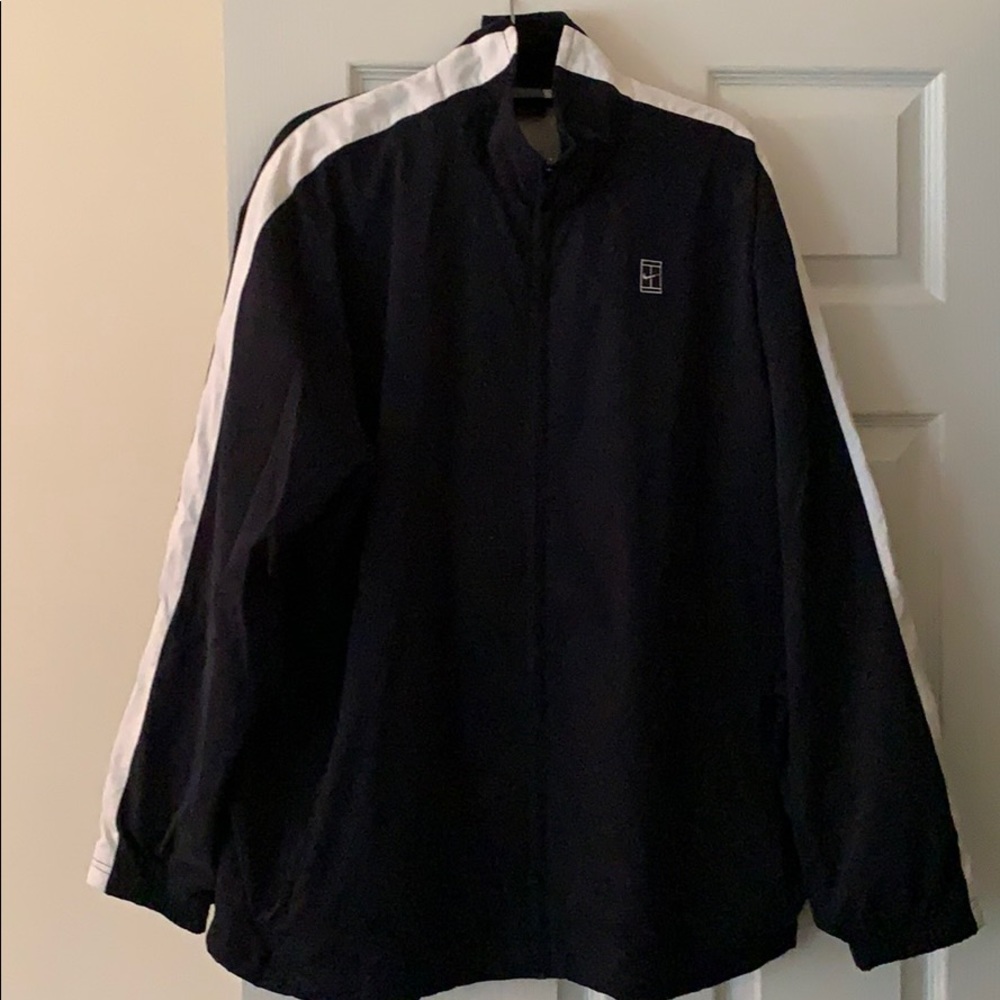 Nike lined jacket. White stripes. Large